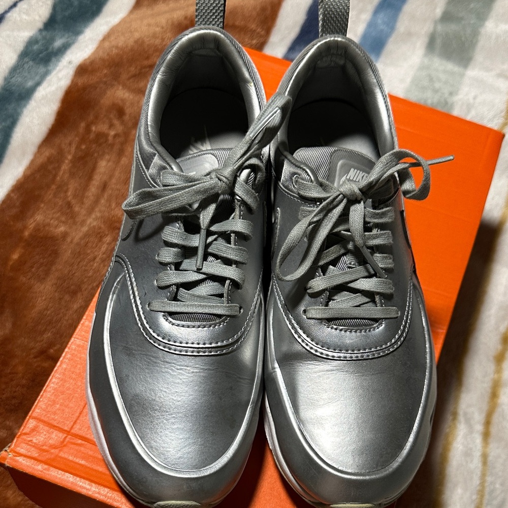 Nike women Metallic Silver Low-Top Sneakers